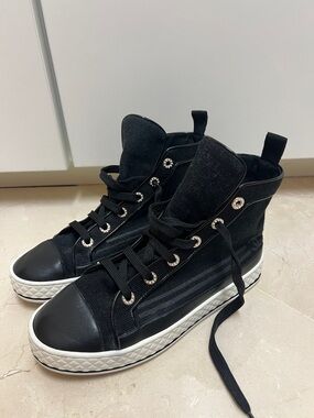 CHANEL Black High-Top Lace-Up Sneakers with White Sole and pearl elements